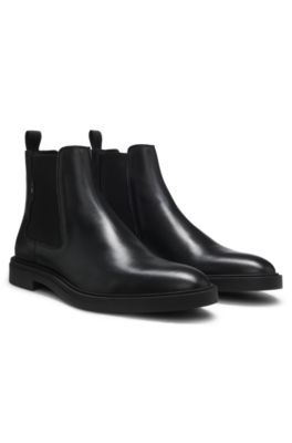 Bottines Chelsea en cuir lustr&eacute; avec surpiq&ucirc;re embl&eacute;matique, Noir