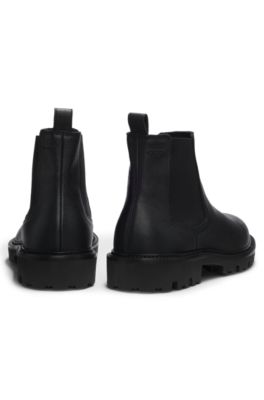 Grained leather boots with elastic side panels, Black
