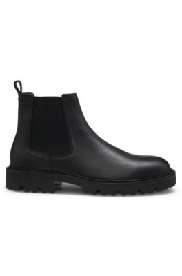 Lug-sole Chelsea boots in leather, Black