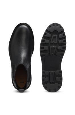 Lug-sole Chelsea boots in leather, Black