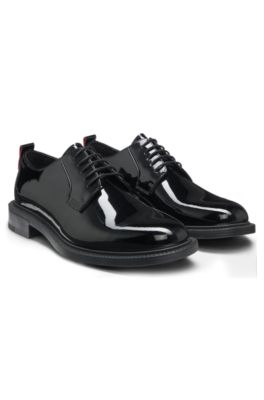 Embossed-logo Derby shoes in patent leather, Black
