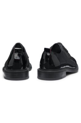 Embossed-logo Derby shoes in patent leather, Black