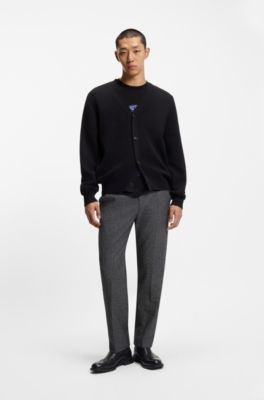 Botines Chelsea en piel con detalles calados, Negro