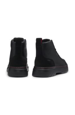 High-top boots in leather and faux suede, Black