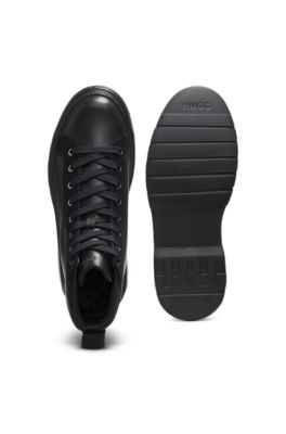 High-top boots in leather and faux suede, Black