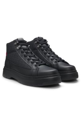 Botines con monograma y apliques de piel, Negro
