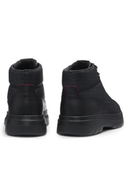 Botines con monograma y apliques de piel, Negro