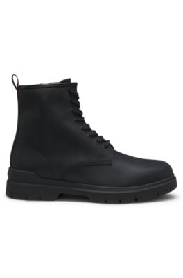 Embossed-logo half boots in leather, Black