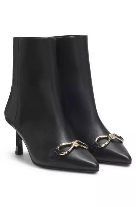 Hardware-trim ankle boots in faux leather