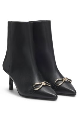 Botas de piel sint&eacute;tica con ribete met&aacute;lico y tac&oacute;n de 7&nbsp;cm, Negro