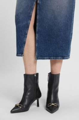 Hardware-trim ankle boots in faux leather, Black