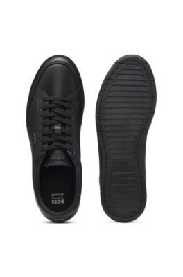 Embossed-logo trainers in leather, Black