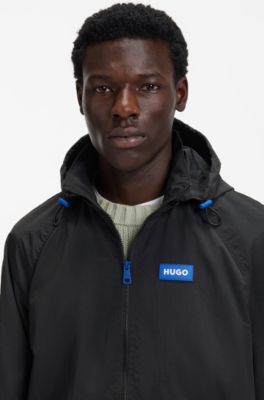 Chaqueta cortavientos repelente al agua con capucha extra&iacute;ble, Negro