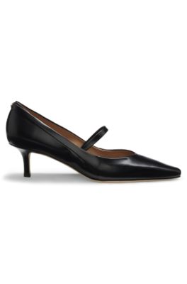 Strap-detail pumps in polished leather, Black