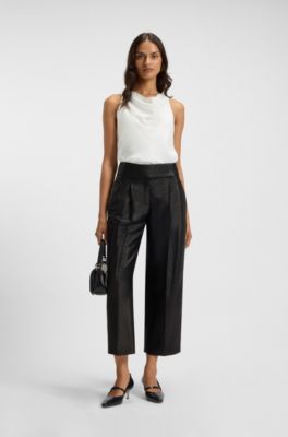 Strap-detail pumps in polished leather, Black