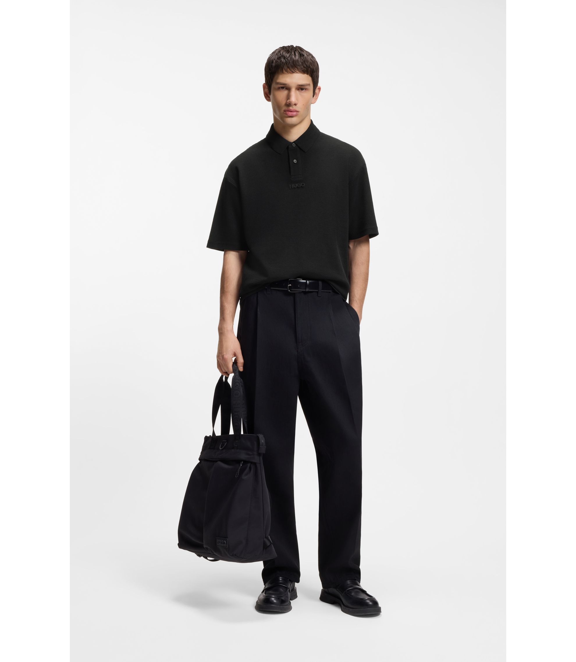 HUGO - Waffle-structured polo shirt in cotton - Black