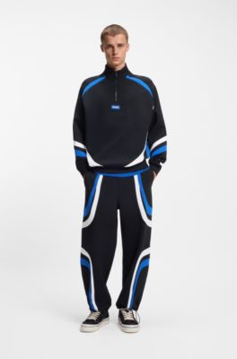 Bas de surv&ecirc;tement en coton stretch &agrave; empi&egrave;cements color&eacute;s, Noir