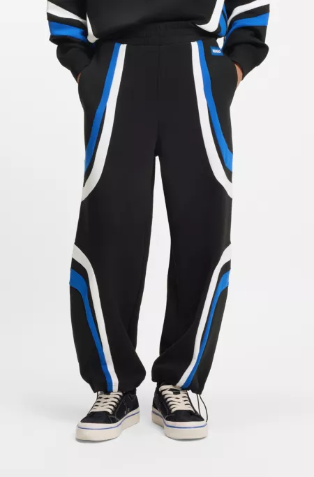 Stretch-cotton tracksuit bottoms with colourful panelling