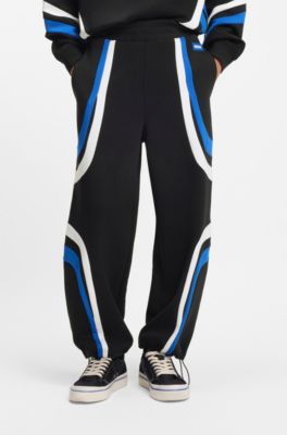 Bas de surv&ecirc;tement en coton stretch &agrave; empi&egrave;cements color&eacute;s, Noir