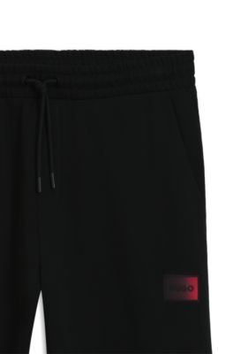 Gradient-logo tracksuit bottoms in cotton terry, Black