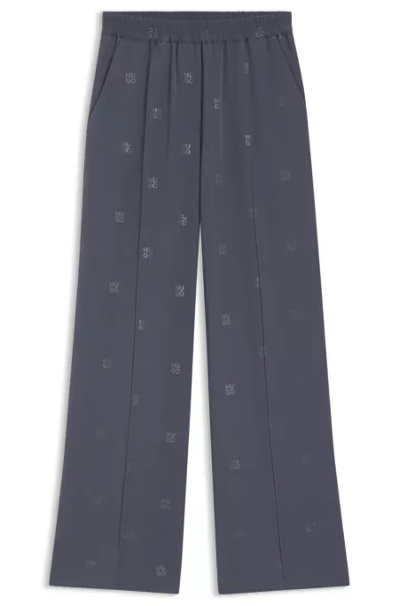 Relaxed-fit trousers with stacked logos