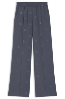 Relaxed-fit trousers with stacked logos, Patterned