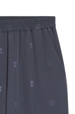 Relaxed-fit trousers with stacked logos, Patterned