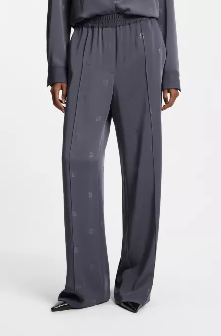 Relaxed-fit trousers with stacked logos