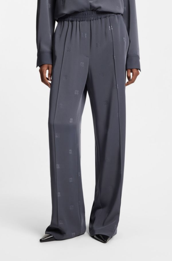 Relaxed-fit trousers with stacked logos