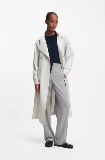 Belted coat with double-breasted closure