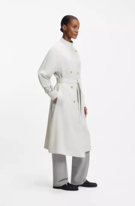 Belted coat with double-breasted closure