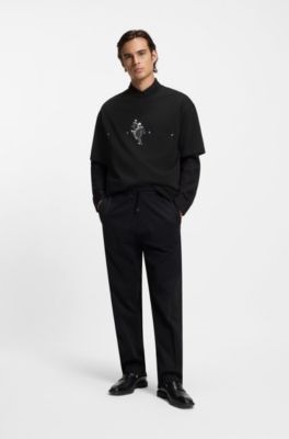Camiseta oversize fit de punto de algod&oacute;n con ilustraci&oacute;n gr&aacute;fica, Negro
