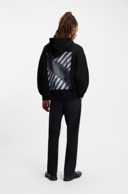 Sudadera oversize fit de felpa de algod&oacute;n con capucha y estampado gr&aacute;fico, Negro