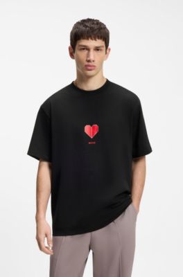 Camiseta unisex de punto de algod&oacute;n con estampado de corazones de origami, Negro