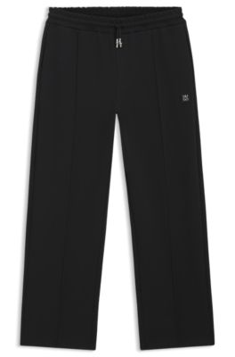 Pintuck-pleat tracksuit bottoms in a relaxed fit, Black