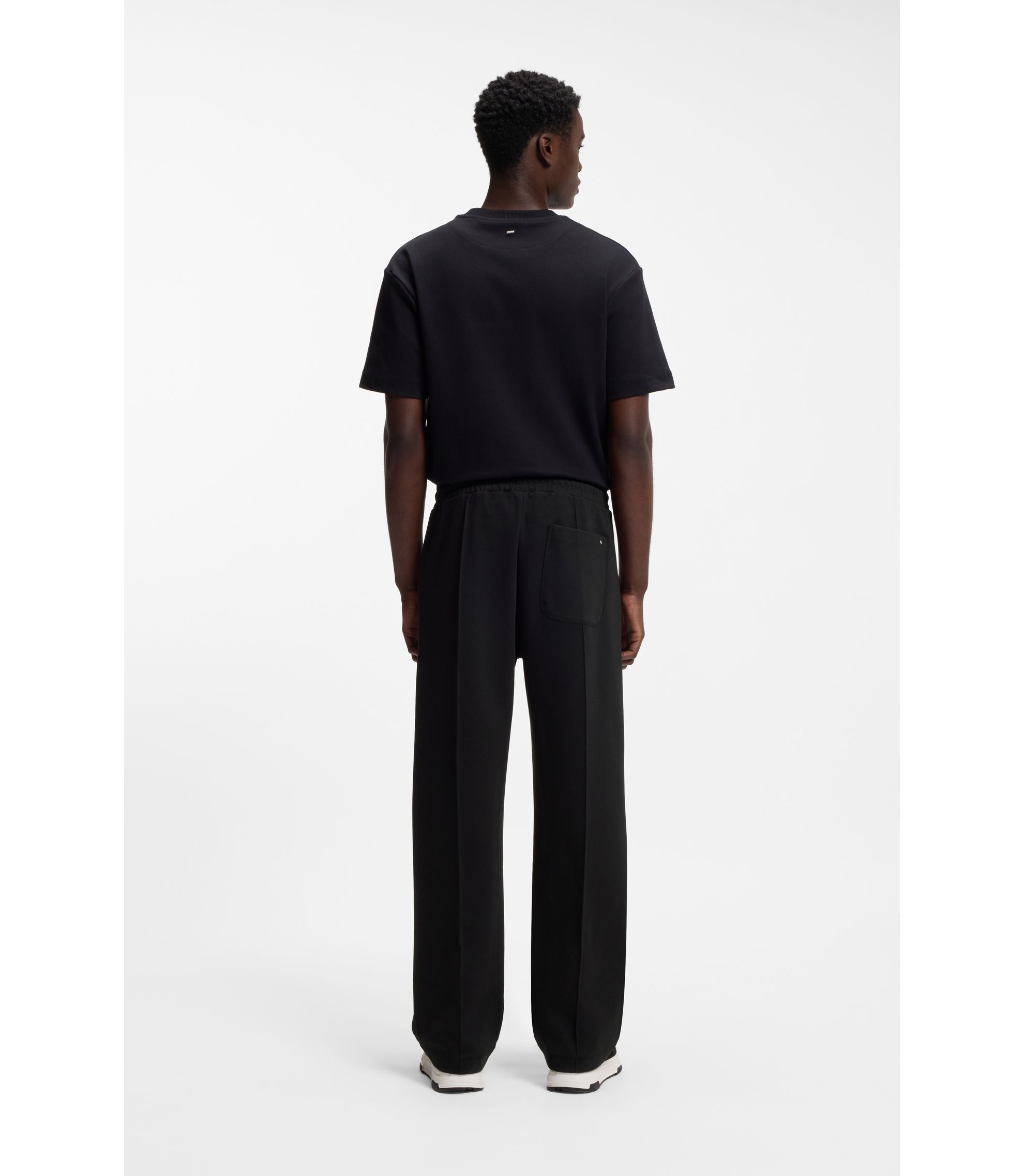 HUGO - Pintuck-pleat tracksuit bottoms in a relaxed fit - Black