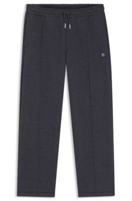 Pintuck-pleat tracksuit bottoms in a relaxed fit, Grey