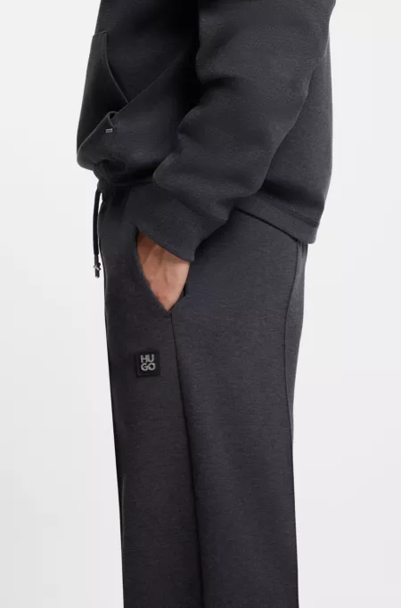 Pintuck-pleat tracksuit bottoms in a relaxed fit