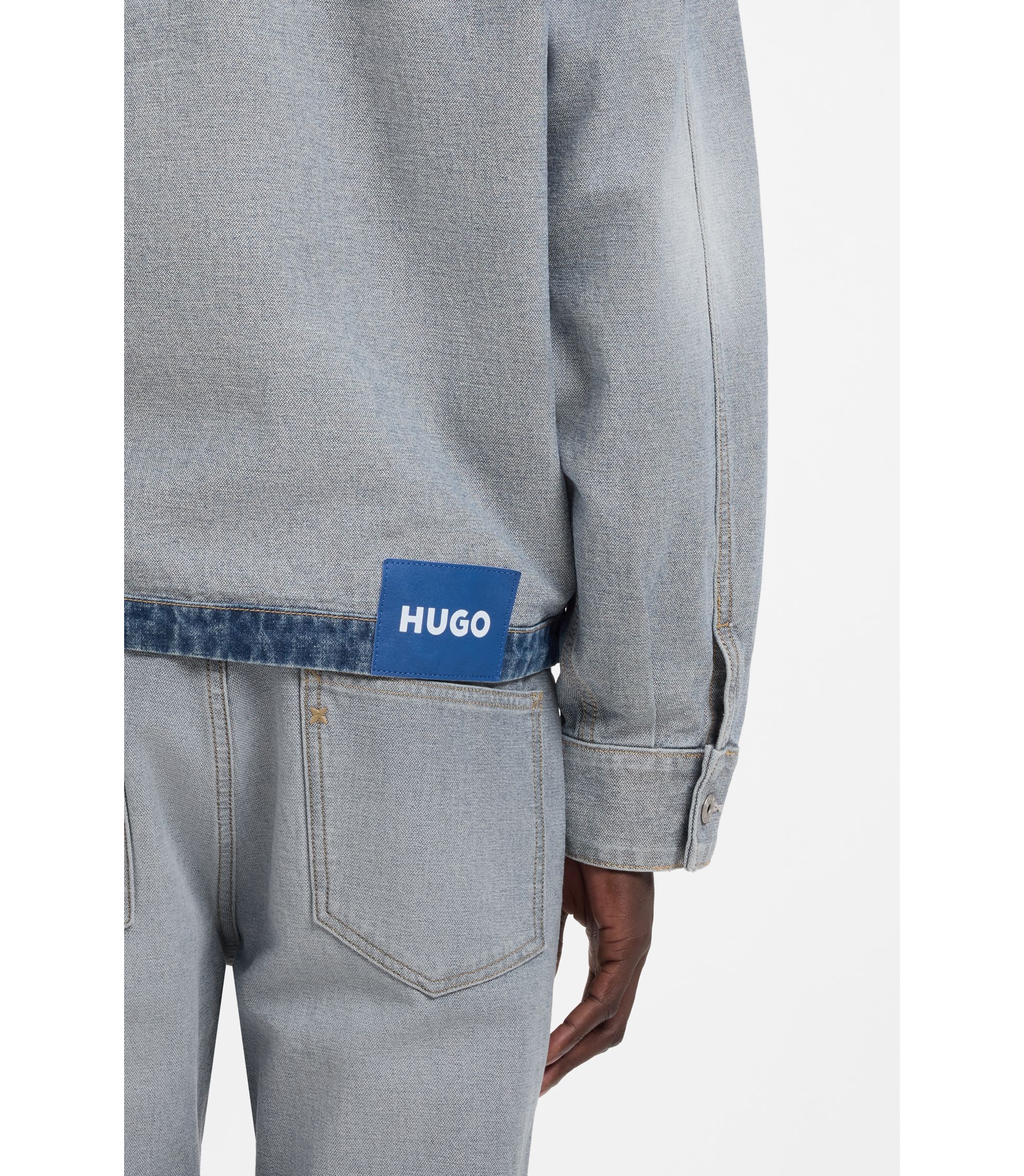 HUGO - Denim jacket with inside-out styling - Light Blue