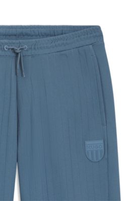 Cotton-blend tracksuit bottoms with drop-needle stripe, Light Blue