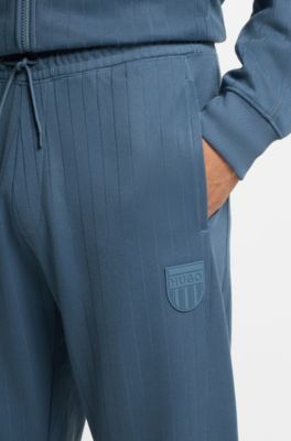 Pantalones de ch&aacute;ndal de algod&oacute;n con rayas de puntos saltados, Celeste