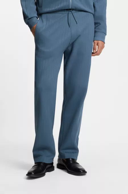 Cotton-blend tracksuit bottoms with drop-needle stripe