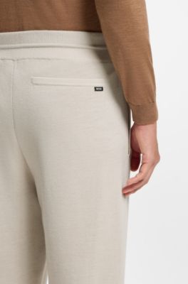 Cuffed tracksuit bottoms in virgin wool, White