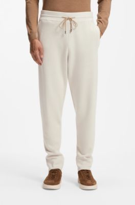 Cuffed tracksuit bottoms in virgin wool, White
