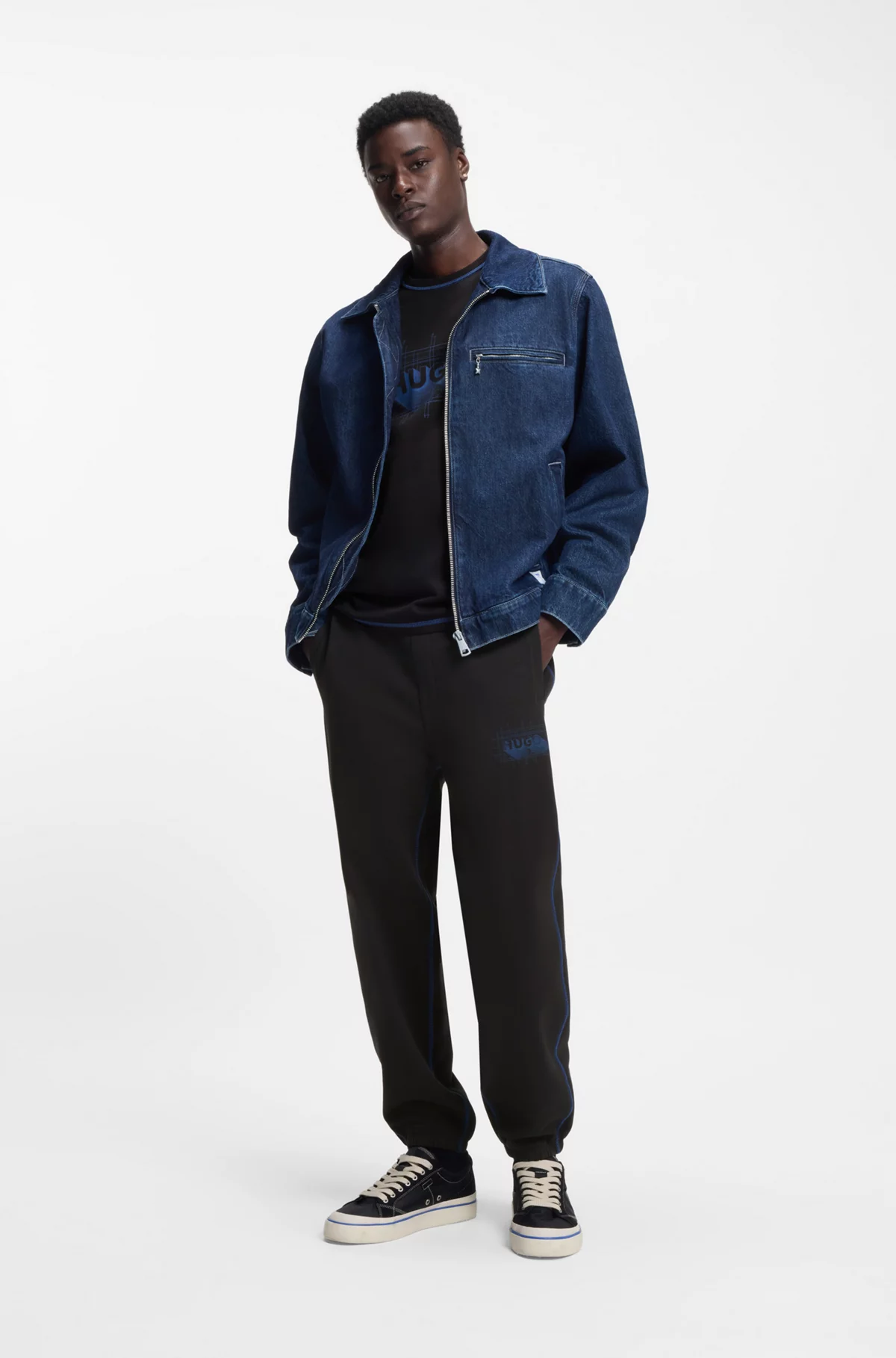 Logo-artwork tracksuit bottoms in cotton terry, Black