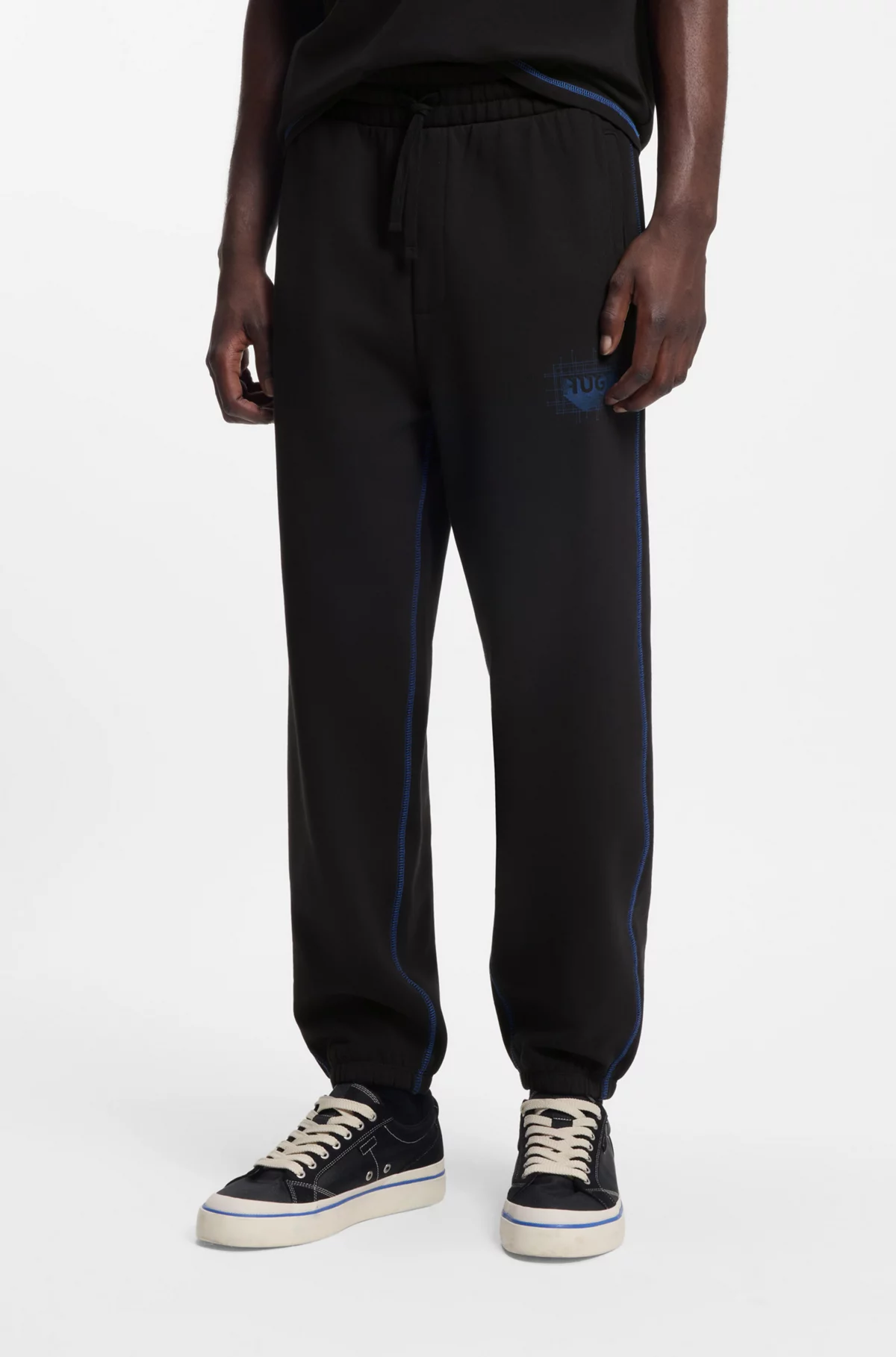 Logo-artwork tracksuit bottoms in cotton terry, Black