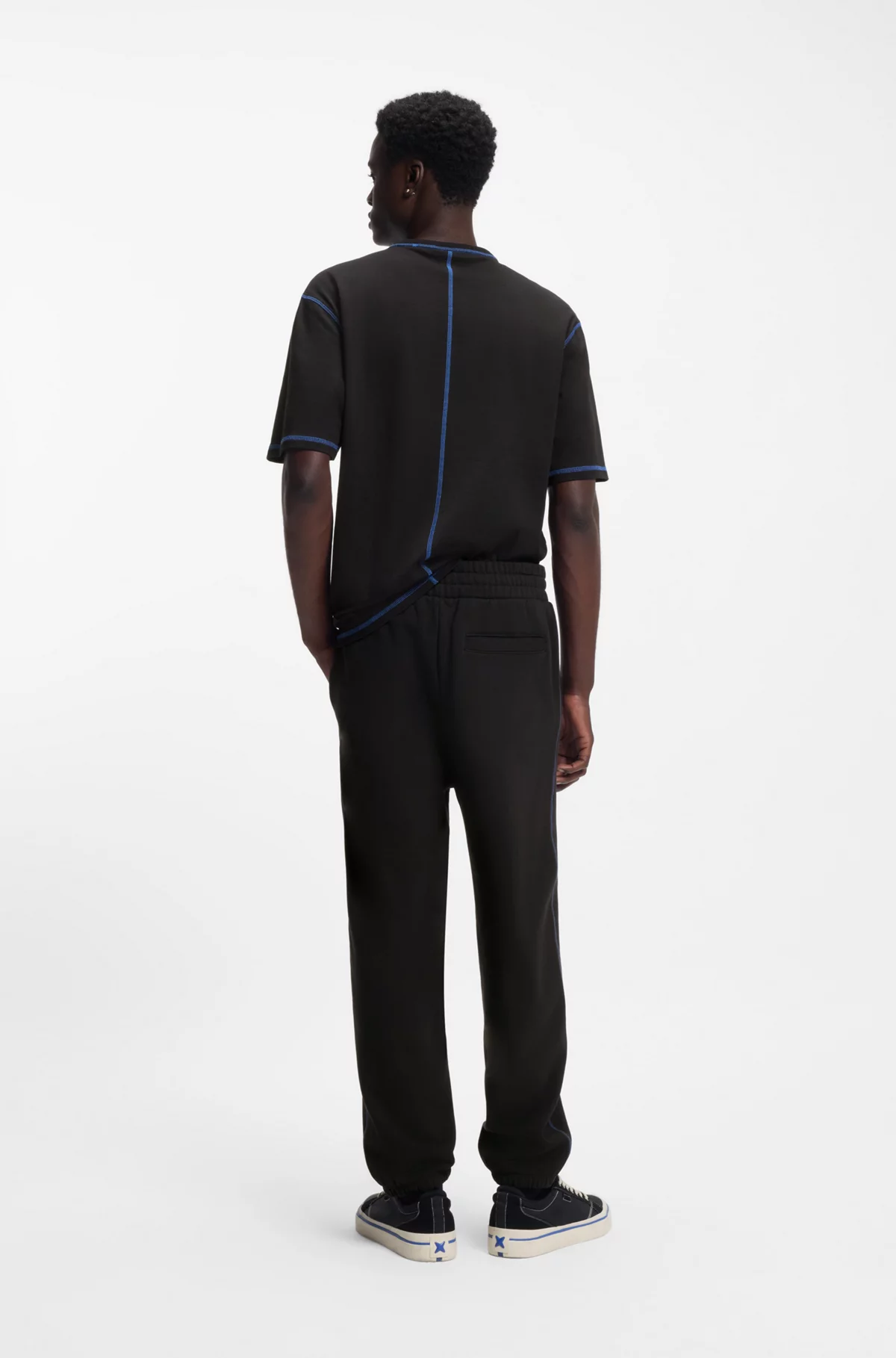 Logo-artwork tracksuit bottoms in cotton terry, Black