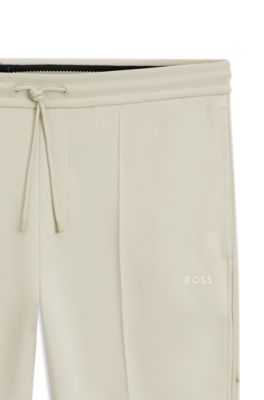 Pantalones de ch&aacute;ndal de algod&oacute;n con detalles de ribete, Beige claro