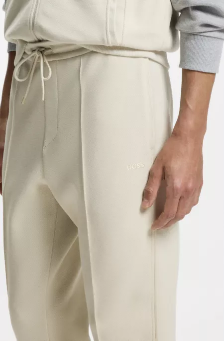 Piping-detail tracksuit bottoms in a cotton blend