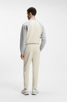 Bas de surv&ecirc;tement en coton m&eacute;lang&eacute; avec passepoils, Beige clair